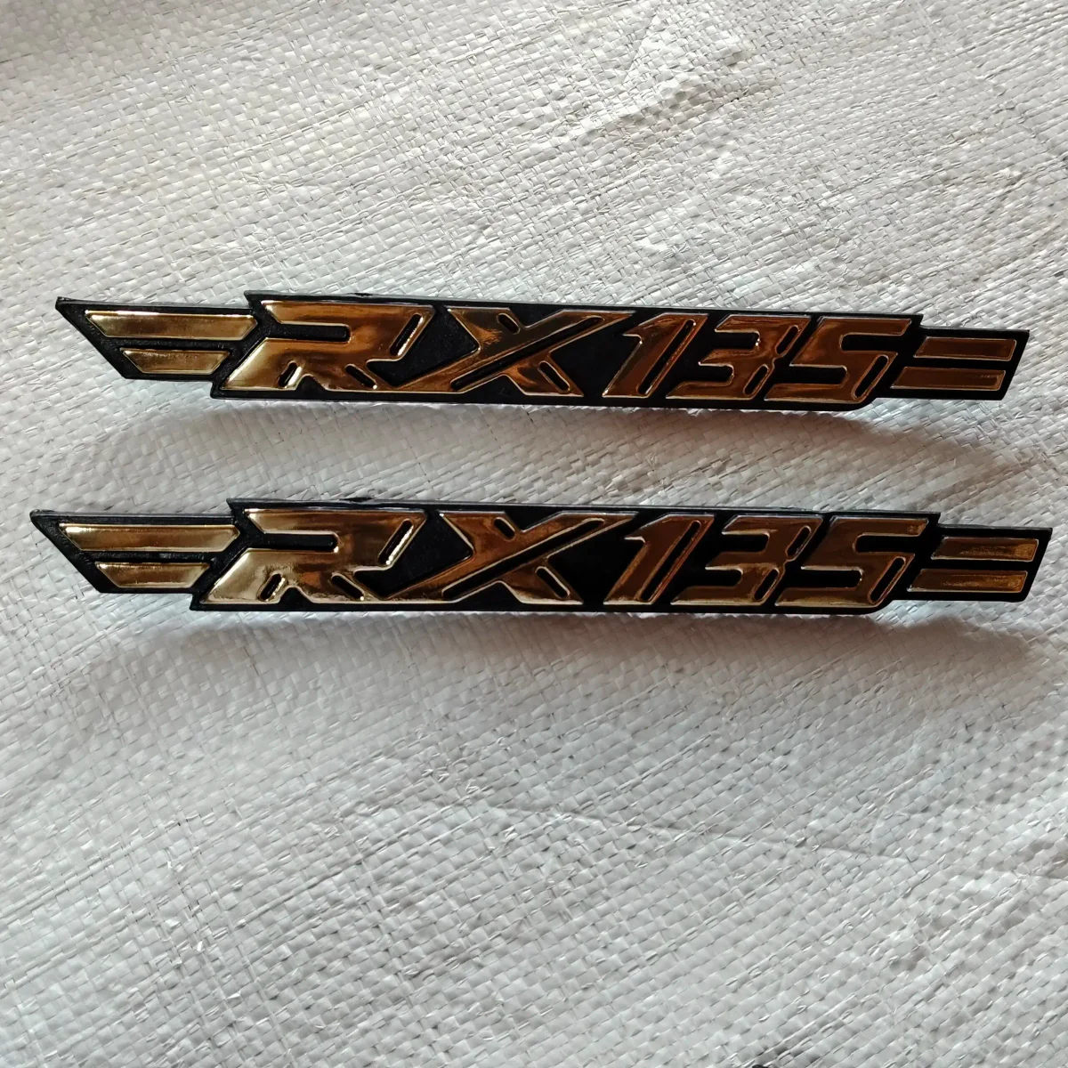 Side panel monogram rx135. Colour gold